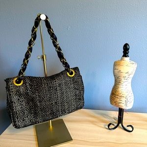 BANANA REPUBLIC black, and gold purse.